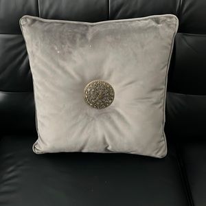 Grey velvety accent pillow from Bombay company